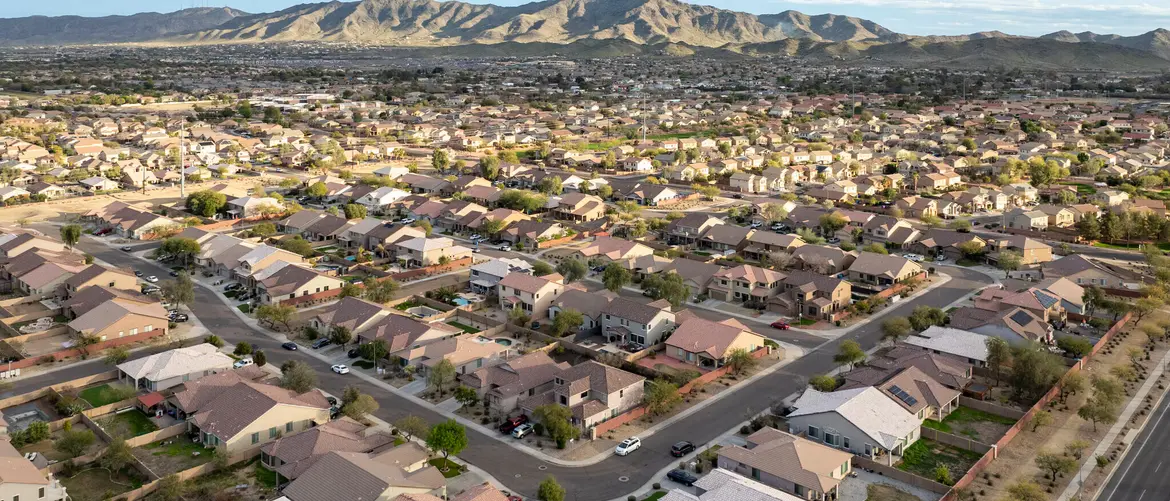 Laveen rooftops with South Mountain behind them, seen from the air